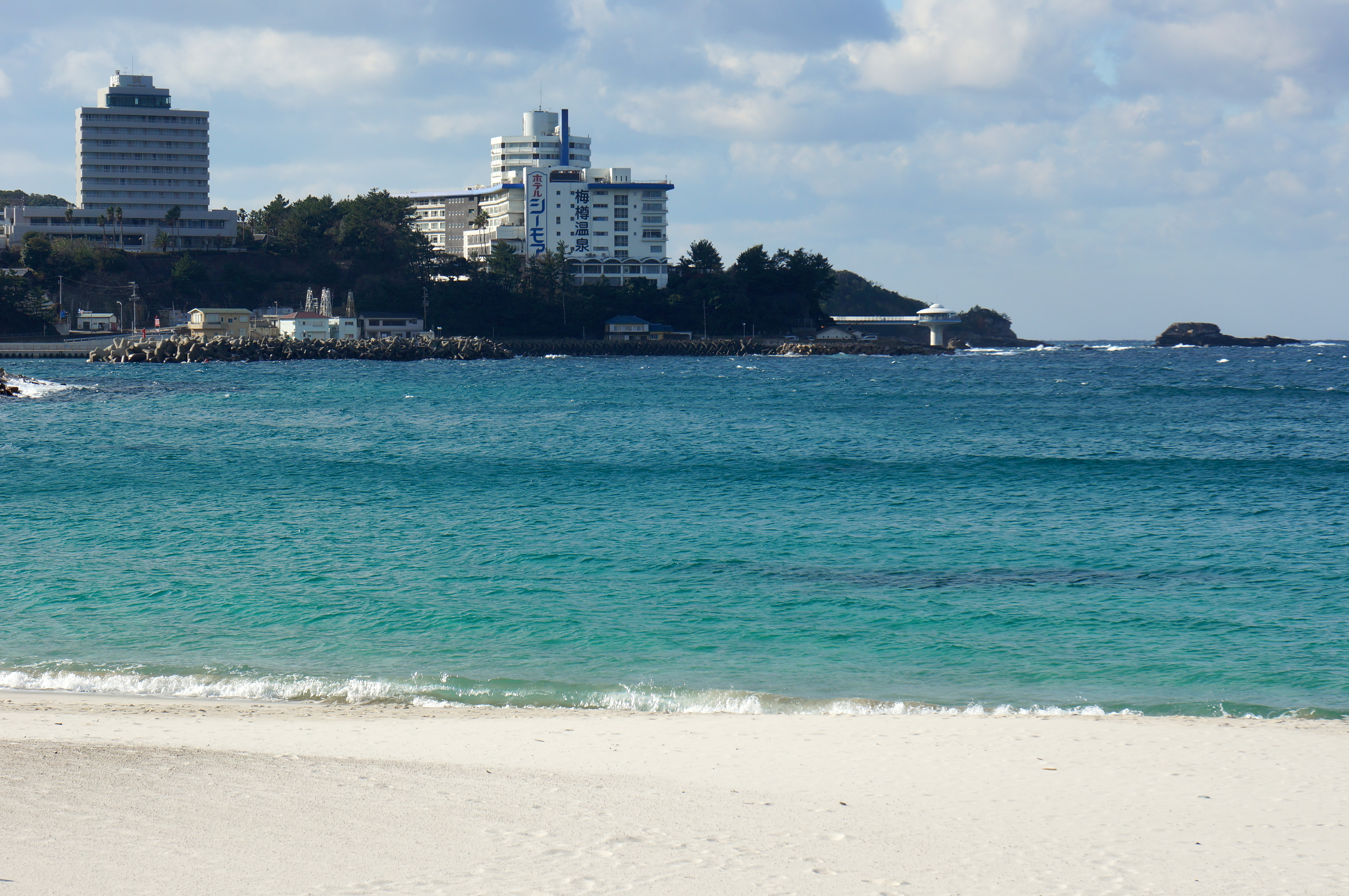View of the white sand beach and resort in Shirarahama Beach in Shirahama, Wakayama prefecture, Japan