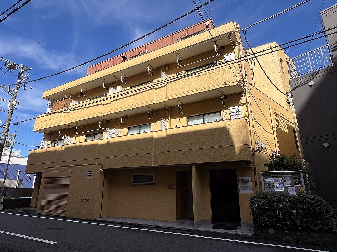 The facade view of Enomoto Mansion, an apartment house in Tokyo, Japan