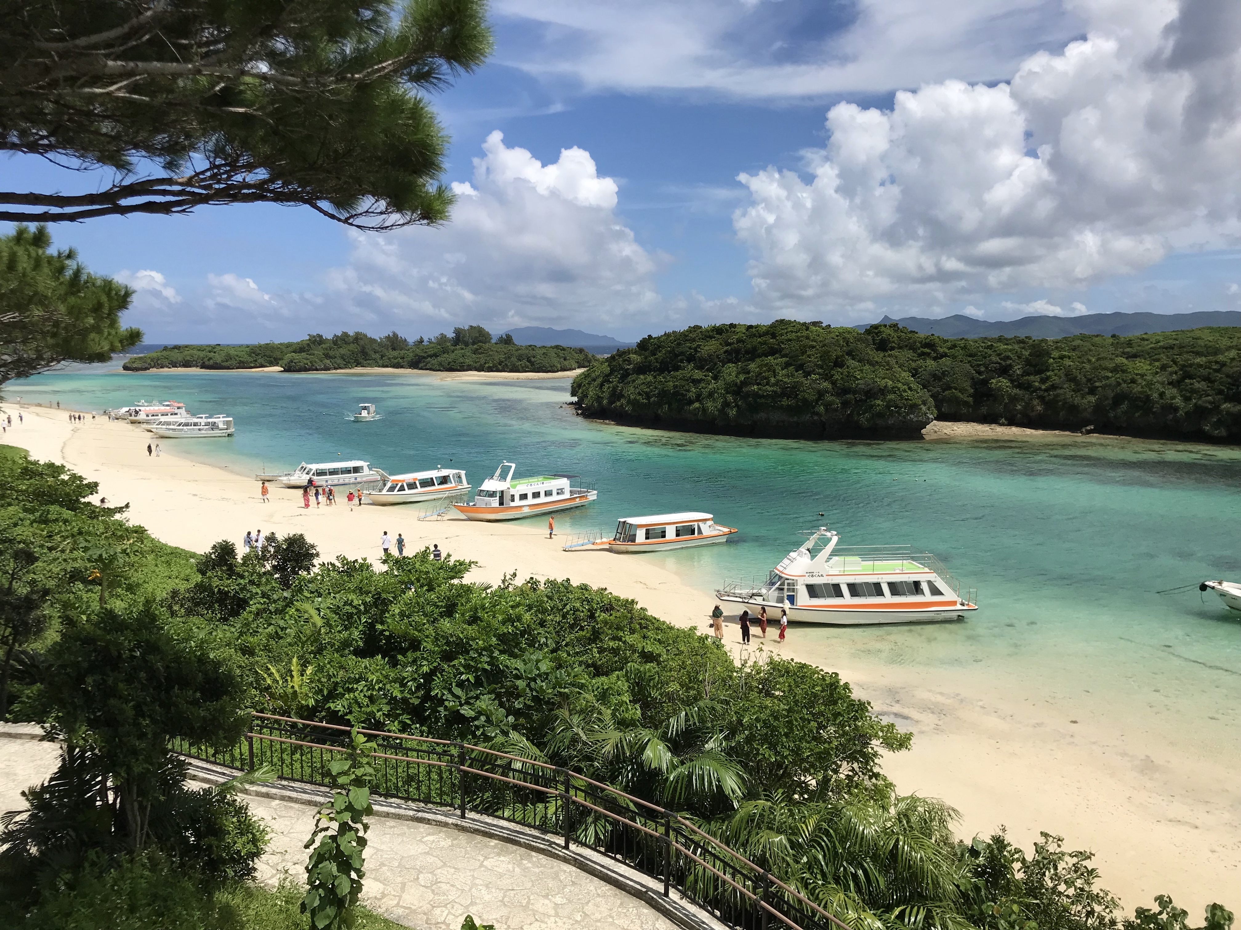 The sea view of Kabira Bay, Ishigaki Island, Okinawa, Japan with boat rentals on the shore