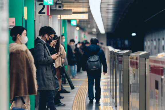 View of passengers on subway train in Tokyo, Japan